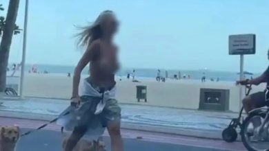 Mulher é presa por fazer topless durante caminhada com cachorros em Balneário Camboriu 4 Foto de Mulher é presa por fazer topless durante caminhada com cachorros em Balneário Camboriu